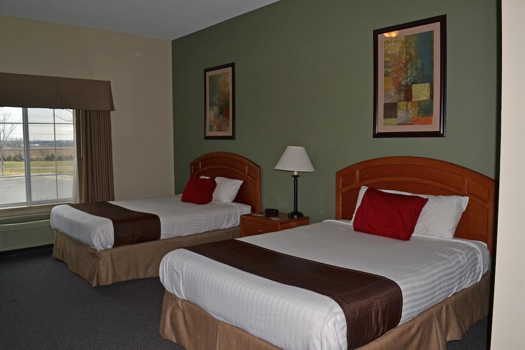 Paola Inn And Suites Quarto foto