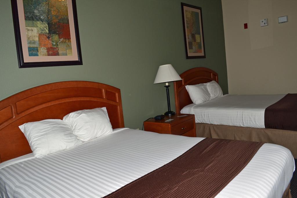 Paola Inn And Suites Quarto foto