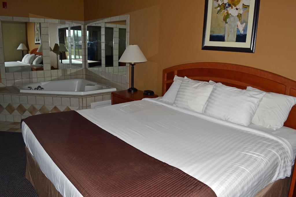 Paola Inn And Suites Quarto foto