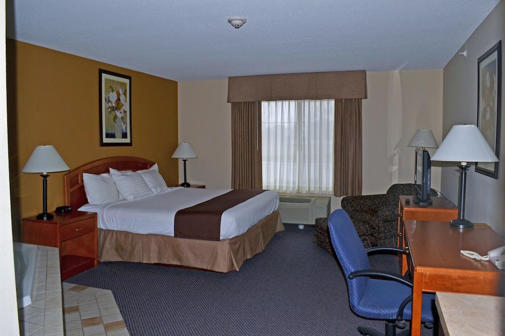 Paola Inn And Suites Quarto foto